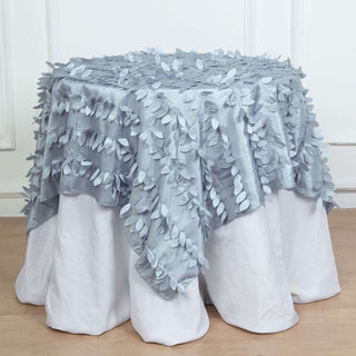 Elevate Your Tablescapes with the 54" Dusty Blue 3D Leaf Petal Taffeta Fabric Square Table Overlay Elevate Your Tablescapes with the 54" Dusty Blue 3D Leaf Petal Taffeta Fabric Square Table Overlay