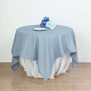 Elevate Your Event Decor with the Dusty Blue Square Polyester Table Overlay Elevate Your Event Decor with the Dusty Blue Square Polyester Table Overlay