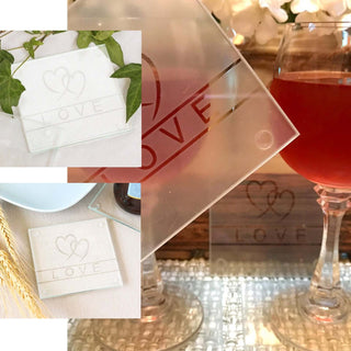 Frosted glass coasters with heart design and "LOVE" text