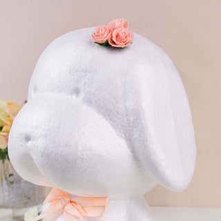Decorative dog figurine with flowers on its head.