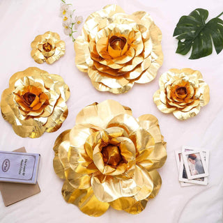 Gold paper flower decorations in various sizes for elegant home decor.