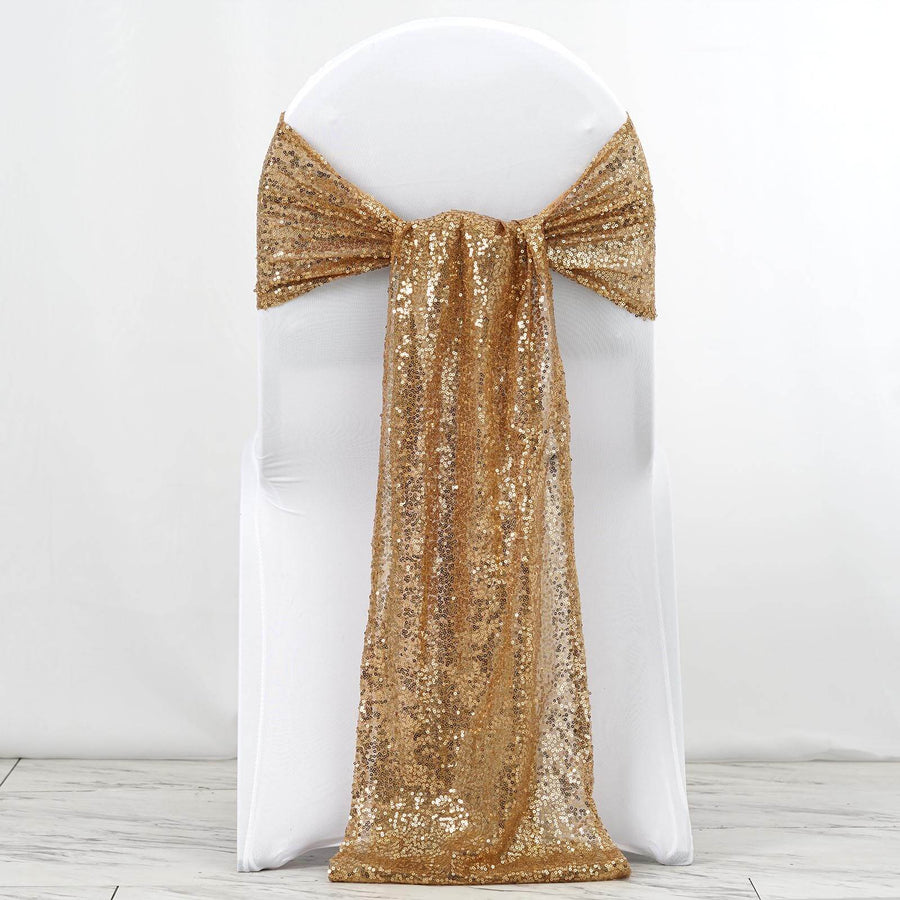 Gold sequin chair sash draped elegantly over a white chair.