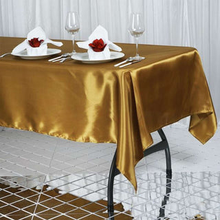 Add a Touch of Elegance with the Gold Satin Tablecloth Add a Touch of Elegance with the Gold Satin Tablecloth