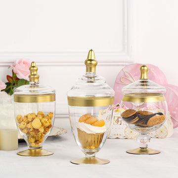 Set of 3 Gold Trim Clear Glass Apothecary Party Favor Candy Jars With Snap On Lids - 9" 9" 8"