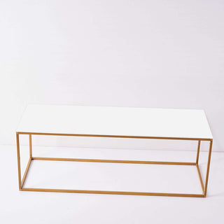 White modern coffee table with gold metal frame