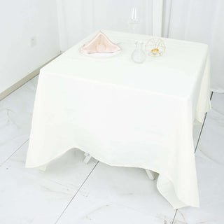 Experience Luxury and Durability with the Ivory Premium Polyester Square Tablecloth Experience Luxury and Durability with the Ivory Premium Polyester Square Tablecloth