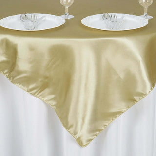 Create a Memorable Event with the Champagne Square Smooth Satin Table Overlay Create a Memorable Event with the Champagne Square Smooth Satin Table Overlay