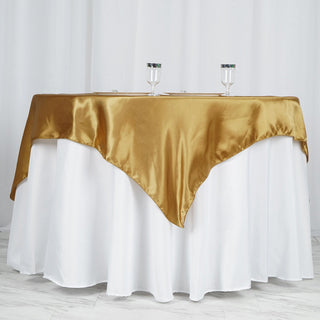 Elevate Your Event Decor with the Gold Square Smooth Satin Table Overlay