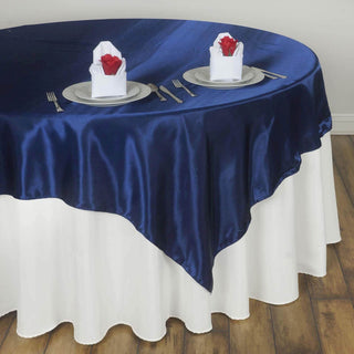 Enhance Your Event Decor with the Navy Blue Square Smooth Satin Table Overlay Enhance Your Event Decor with the Navy Blue Square Smooth Satin Table Overlay