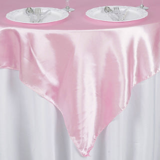 Enhance Your Table Setting with a Pink Satin Table Overlay