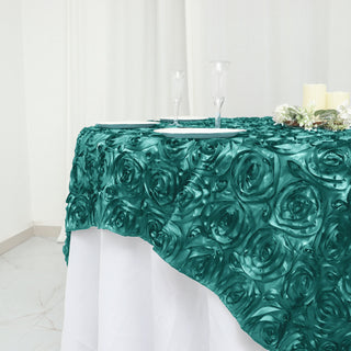Create Unforgettable Memories with the Turquoise 3D Rosette Satin Square Table Overlay
