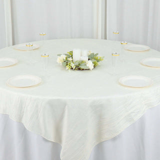 Dress Up Your Tables with the Ivory Accordion Crinkle Taffeta Table Overlay Dress Up Your Tables with the Ivory Accordion Crinkle Taffeta Table Overlay