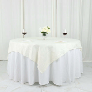 Elegant Ivory Accordion Crinkle Taffeta Table Overlay for a Luxurious Tablescape Elegant Ivory Accordion Crinkle Taffeta Table Overlay for a Luxurious Tablescape