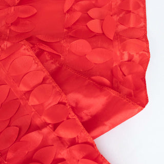 Red fabric with layered petal design, ideal for crafting and decoration.