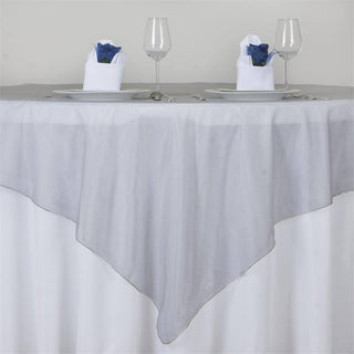 Enhance Your Table Setting with the Silver Organza Square Table Overlay