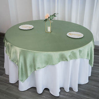 Elevate Your Event with the Sage Green Satin Square Tablecloth Overlay