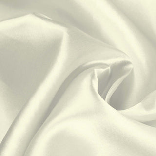 Luxurious soft white satin fabric draped elegantly.