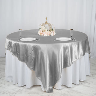 Create a Luxurious Setting with Silver Satin Table Decor