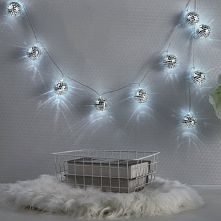Add a Festive Touch with the 6ft Silver Disco Mirror Ball Battery Operated 10 LED String Light Garland Add a Festive Touch with the 6ft Silver Disco Mirror Ball Battery Operated 10 LED String Light Garland