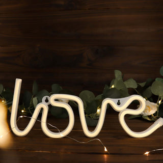 Add a Romantic Glow to Your Space with the 13" Love Neon Light Sign Add a Romantic Glow to Your Space with the 13" Love Neon Light Sign