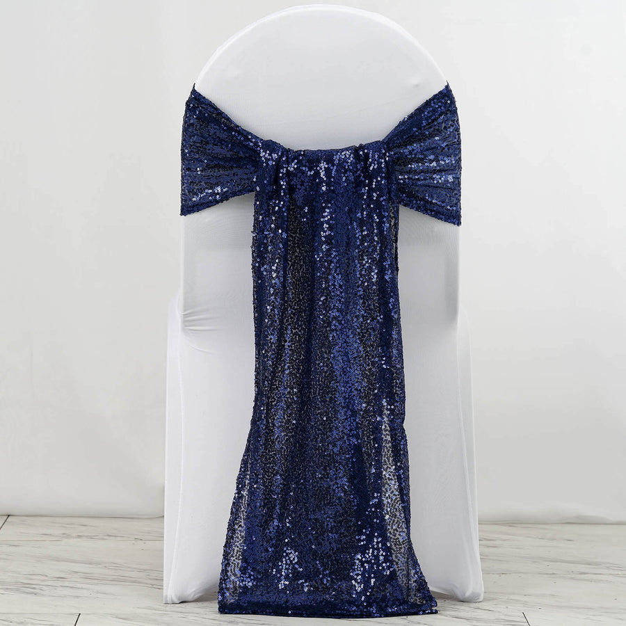 Navy sequin chair sash draped elegantly over a white chair