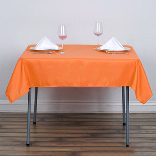 Add Vibrant Elegance to Your Event with the 54"x54" Orange Square Seamless Polyester Tablecloth