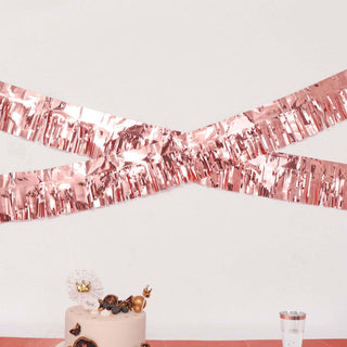 Rose gold fringe garland decoration for parties and celebrations.