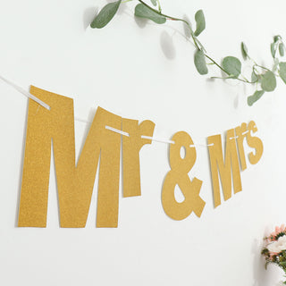 Create Unforgettable Memories with the 3ft Gold Glittered Mr and Mrs Paper Hanging Banner