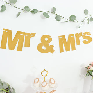 Add a Touch of Glamour to Your Wedding or Anniversary Party with the 3ft Gold Glittered Mr and Mrs Paper Hanging Banner