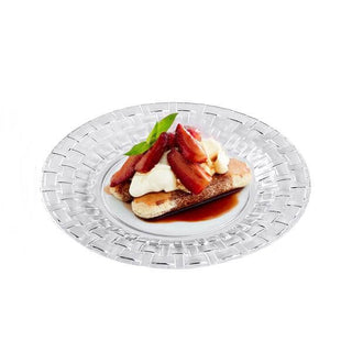 Dessert with toasted bread, cream, and rhubarb on a decorative plate