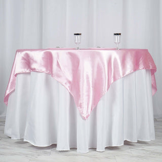 Create a Festive Atmosphere with our Pink Satin Table Overlay Create a Festive Atmosphere with our Pink Satin Table Overlay