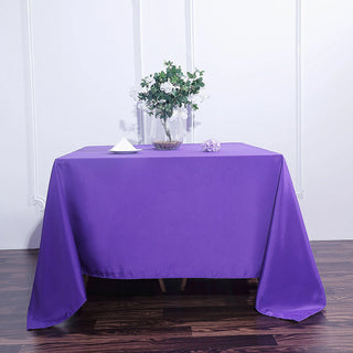 Add Elegance to Your Event with the 90"x90" Purple Seamless Square Polyester Tablecloth