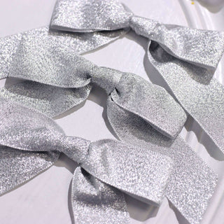 Add Sparkle to Your Decor with Silver Glitter Nylon Ribbon Bows Add Sparkle to Your Decor with Silver Glitter Nylon Ribbon Bows