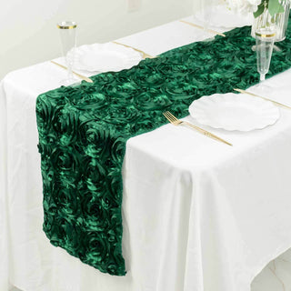 Green rose-patterned table runner on a white tablecloth.