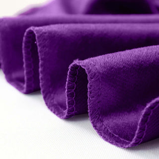 Purple fabric with soft texture and elegant draping.