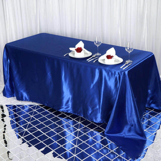 Create Unforgettable Memories with the Royal Blue Satin Seamless Rectangular Tablecloth Create Unforgettable Memories with the Royal Blue Satin Seamless Rectangular Tablecloth