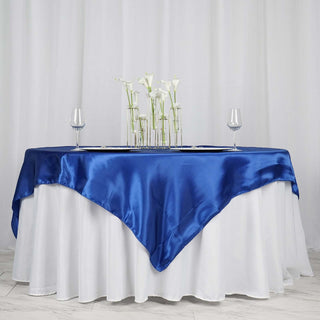 Create a Memorable Experience with the Royal Blue Satin Square Tablecloth Create a Memorable Experience with the Royal Blue Satin Square Tablecloth