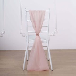 Pink chair sash draped elegantly on a white chiavari chair.