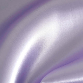 Soft lavender satin fabric texture close-up.