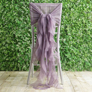 Lavender chair sash draped elegantly over a silver chiavari chair.