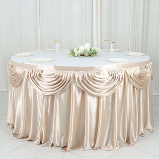 Add a Touch of Opulence with the Beige Pleated Satin Double Drape Table Skirt Add a Touch of Opulence with the Beige Pleated Satin Double Drape Table Skirt