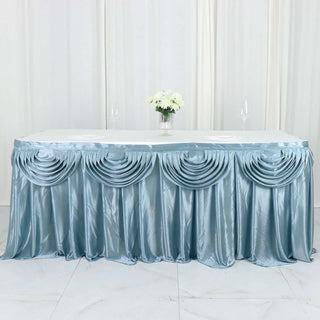 Elevate Your Event Decor with the 14ft Dusty Blue Pleated Satin Double Drape Table Skirt Elevate Your Event Decor with the 14ft Dusty Blue Pleated Satin Double Drape Table Skirt