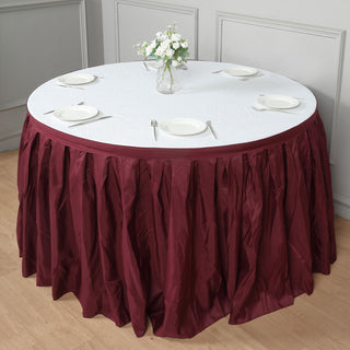 Create an Exotic Tablescape with the Burgundy Pleated Polyester Table Skirt
