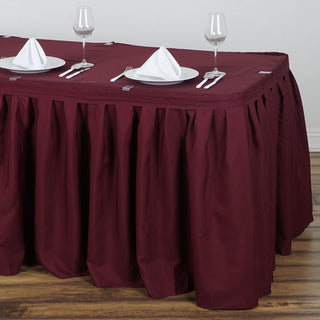 Create Memorable Moments with the Burgundy Pleated Polyester Table Skirt