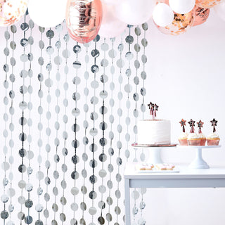 Create an Unforgettable Party Backdrop with the Silver Round Chain Foil Fringe Curtain