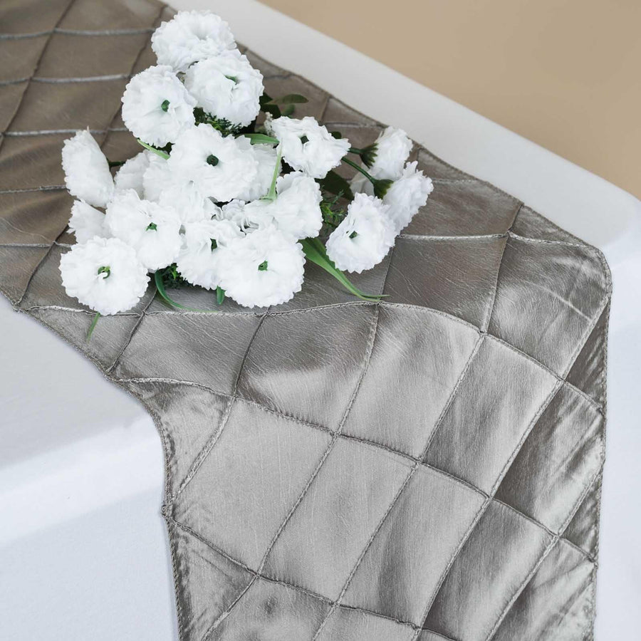 Elegant silver table runner with white floral arrangement. #whtbkgd