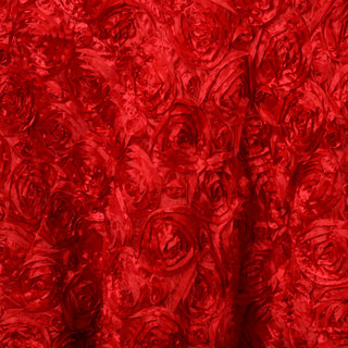 Red floral fabric texture with rose patterns.