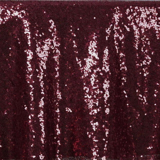 Burgundy sequin fabric with shimmering texture