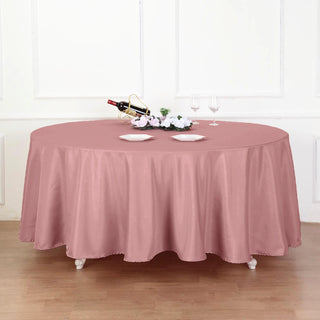 Enhance Your Event with the Dusty Rose 108" Seamless Polyester Round Tablecloth