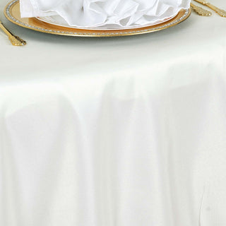 Create an Elegant Ambiance with the Ivory Seamless Polyester Round Tablecloth